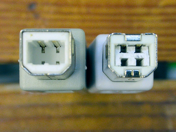 Two USB Type B Plugs, one ruined