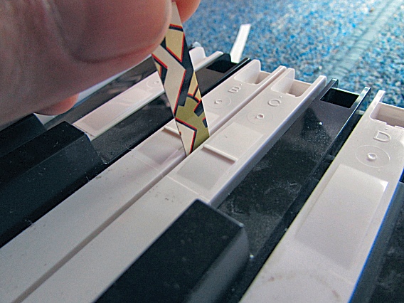 Depressing a Key Stopper