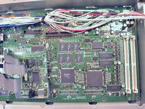 Detaching the MOTIF Main Circuit Board Assembly